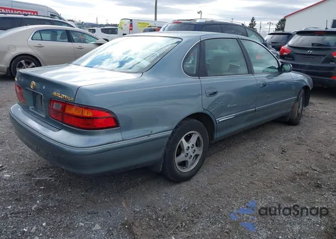 1998 Toyota Avalon Xls z USA, uszkodzony, nr VIN 4T1BF18B8WU223628